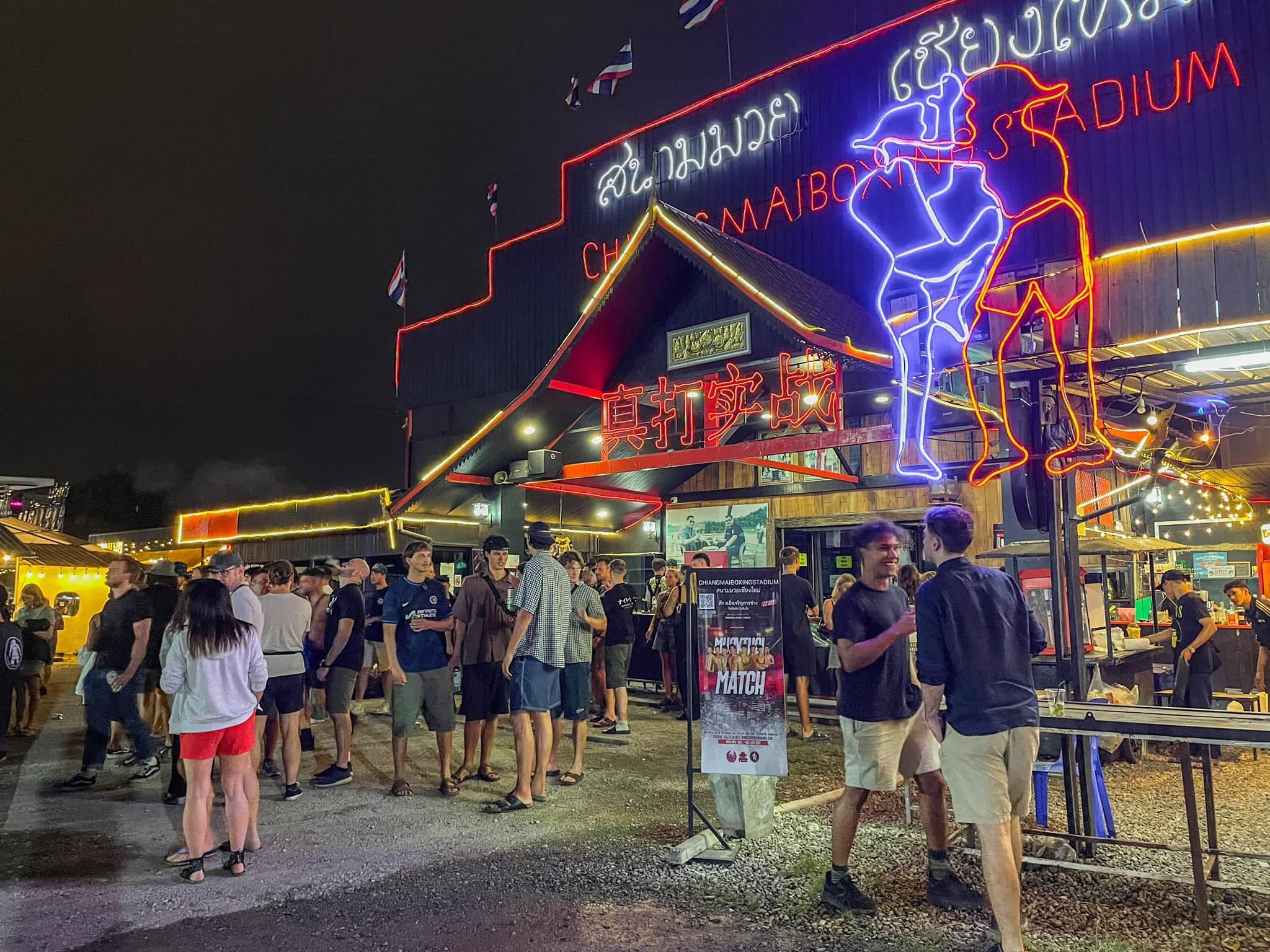 The illuminated entrance to Chiang Mai Boxing Stadium on fight night